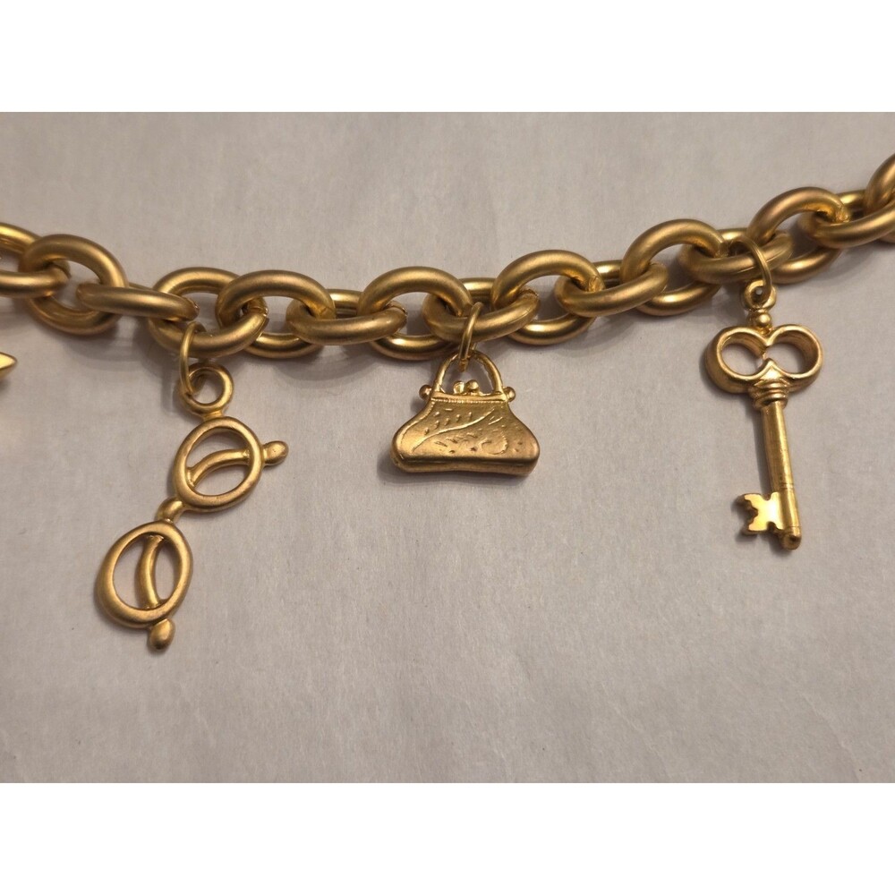 Victoria’s Secret Gold Tone Charm Bracelet VS Logo Missing Charm Toggle Closure - Picture 2 of 5